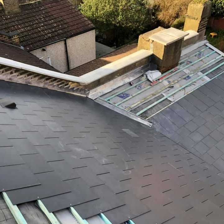 Pitch Right Roofing Solutions Ltd installing tiles on roof